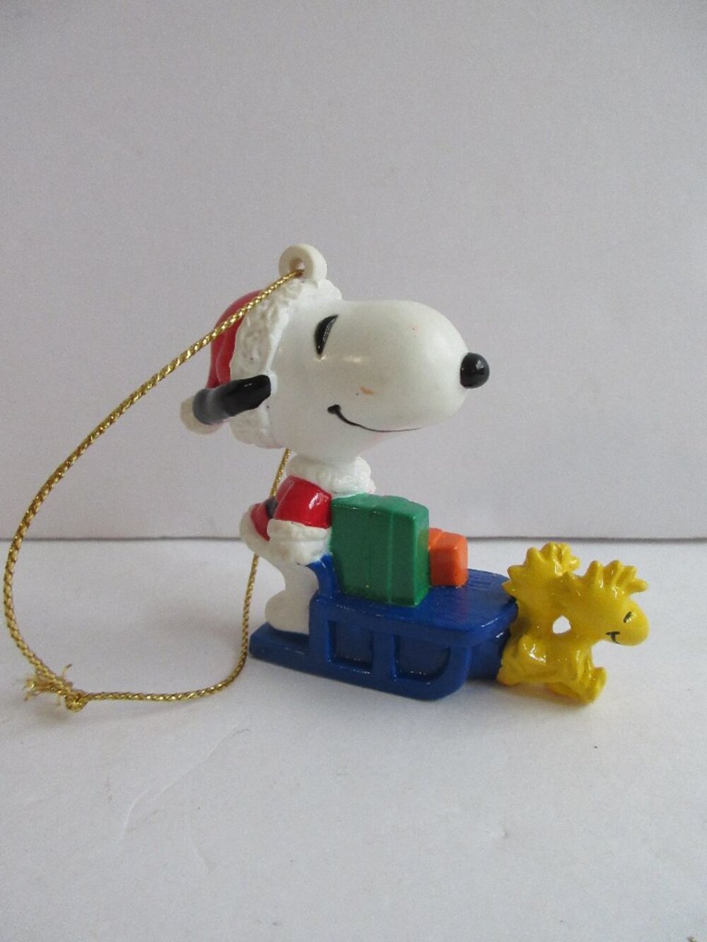 Peanuts PVC Snoopy Santa On Sleigh with Gifts, Woodstock Reindeer 2.5” Ornament